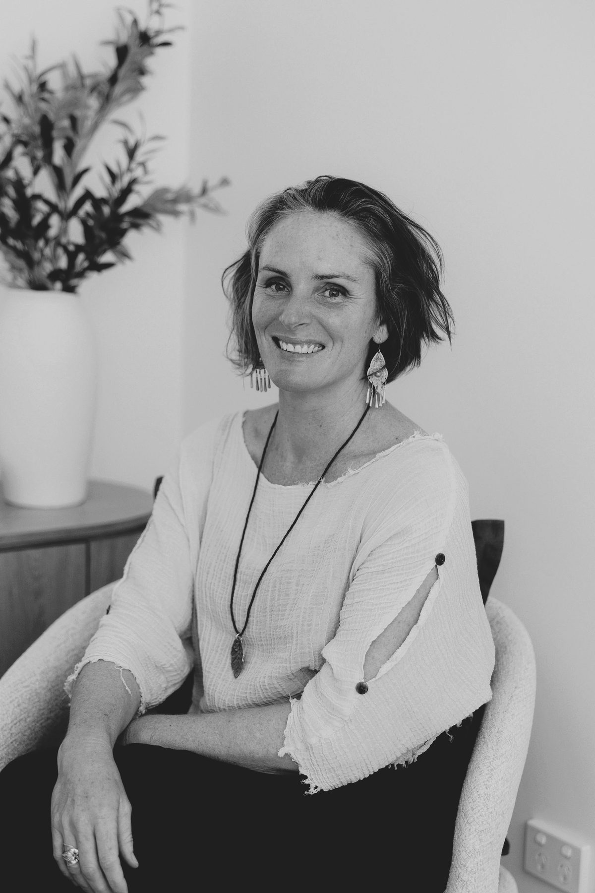 Jaime-Lee Hind seated in a calm therapy room